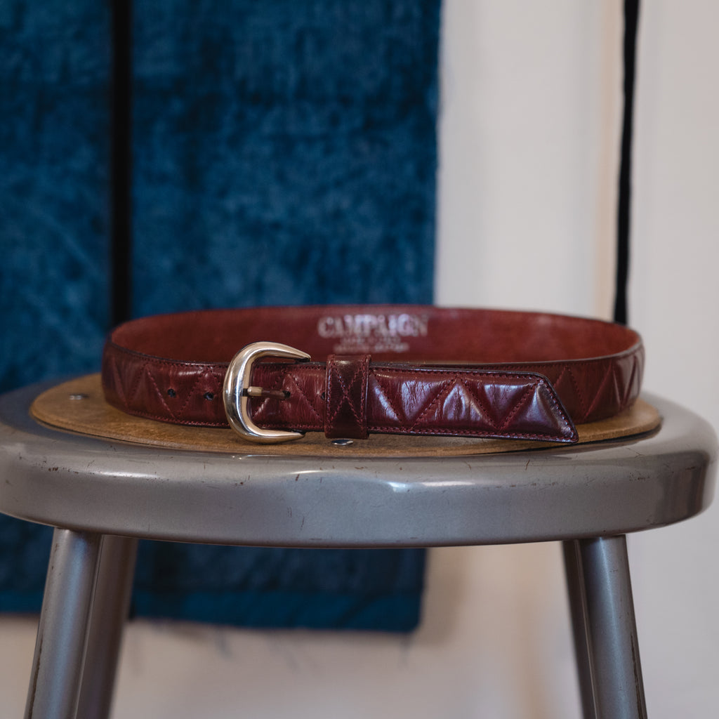 oxblood quilted belt with silver hardware, made in Italy